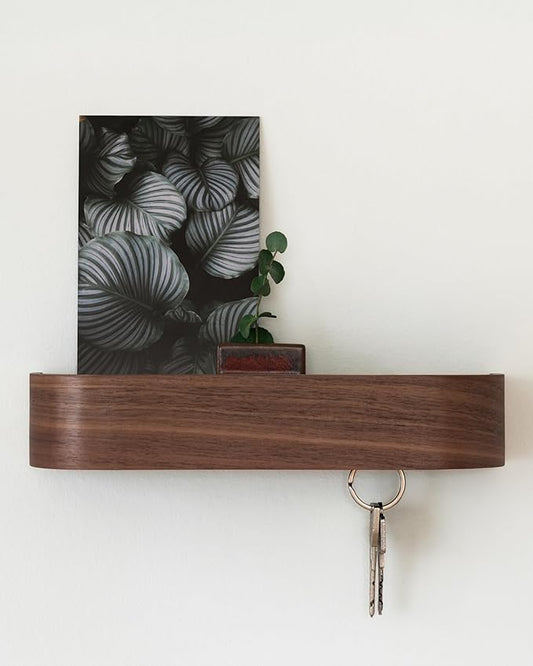 Kazai Toke walnut key holder - minimalist Berlin design representing Techloop Living's calm smart home philosophy